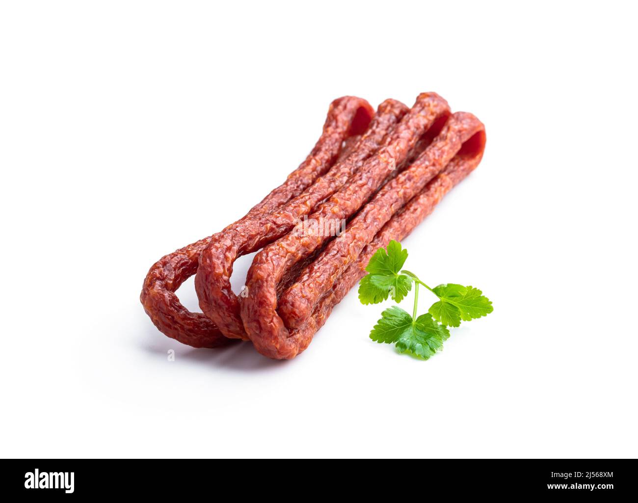 Dry cured Kabanos sausage isolated on white Stock Photo - Alamy