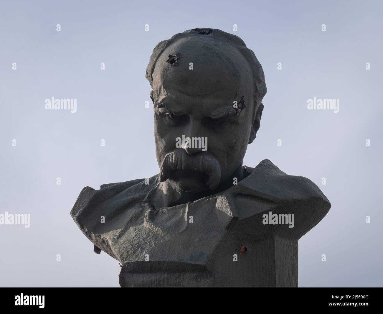 Borodyanka, Ukraine - April 2022: The monument to Taras Shevchenko was shot in the head by Russian troops by terrorists and vandals. Destruction of Ukrainian culture and the genocide of Ukrainians Stock Photo