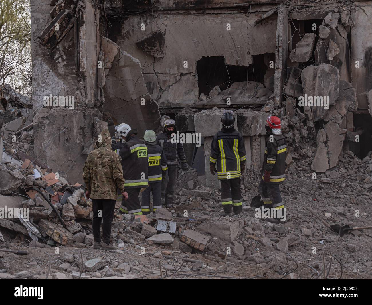 Borodyanka, Ukraine - April 2022: Russia's war against Ukraine. Russian bomb hit civilian buildings. War in Ukraine, ruined building after bombing. Destroyed buildings after the bombing, close-up. Stock Photo