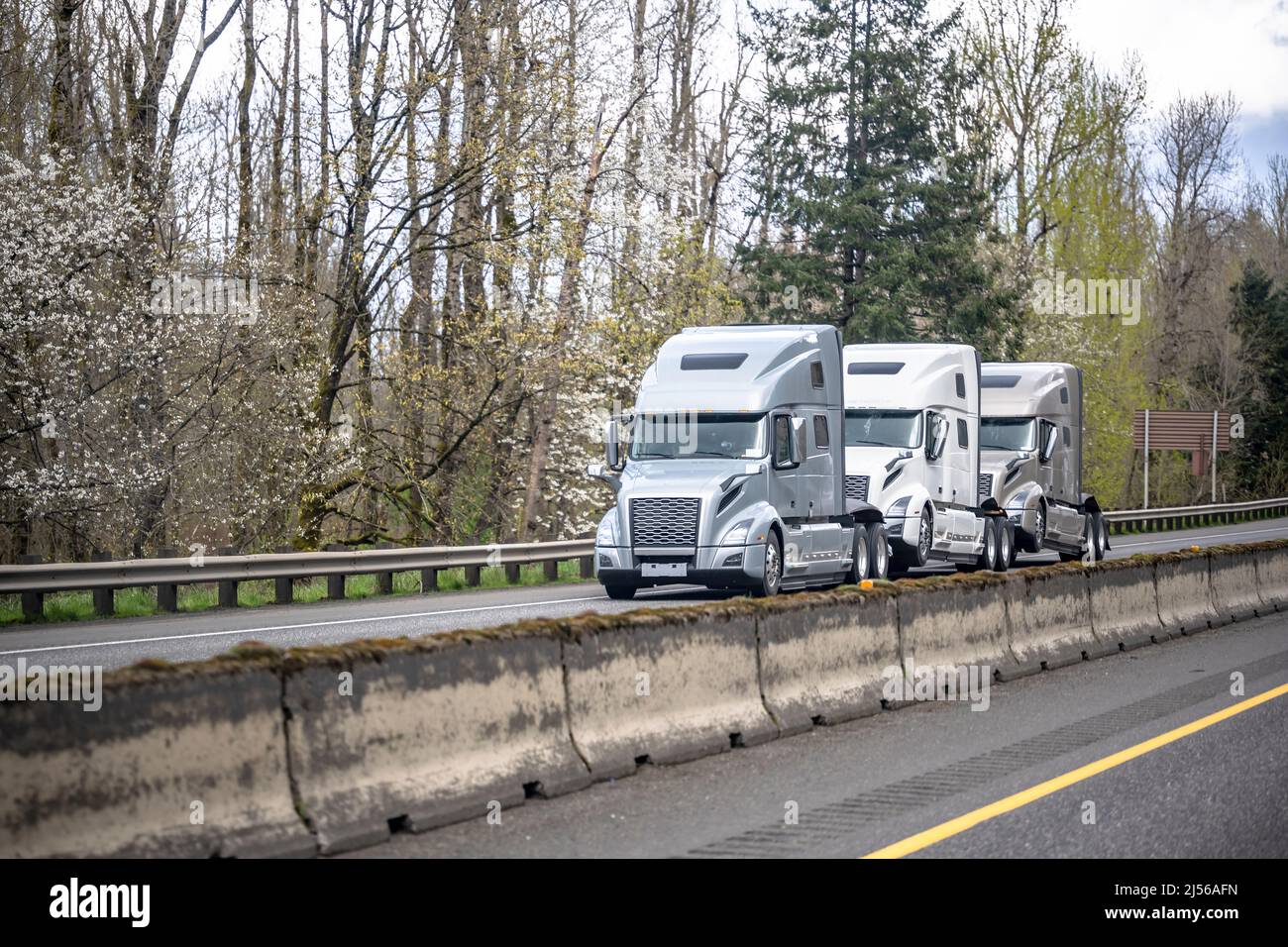 Industrial freight standard powerful gray big rig semi truck tractor