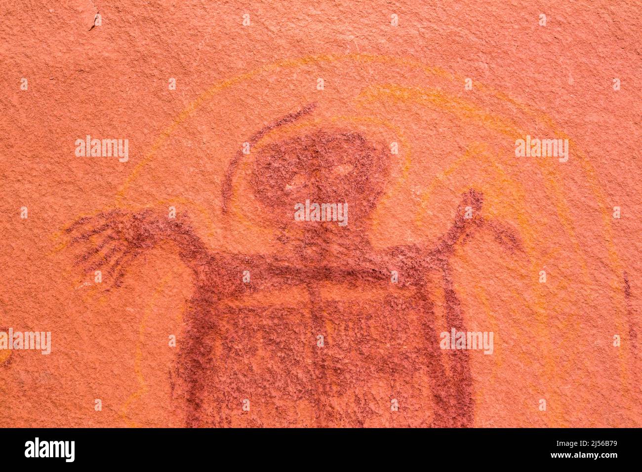 The alien-like ghostly figures of the Barrier Canyon-style Yellow Comet Rock Art Panel near Moab, Utah were painted about 3000 years ago by the Archai Stock Photo