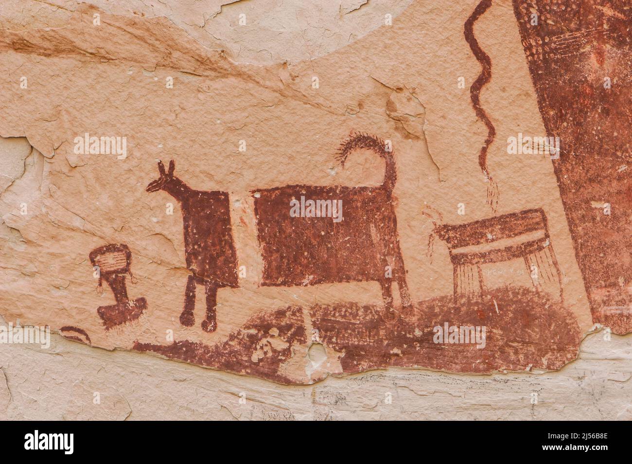 The Temple Mountain pictograph panel, on  the San Rafael Swell in Utah, is an example of Barrier Canyon-style rock art and was painted by the Archaic Stock Photo