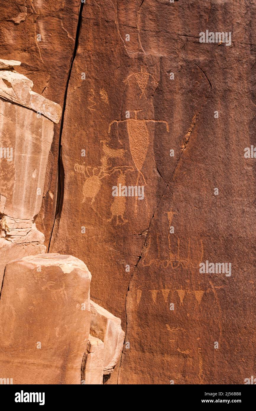 Petroglyphs incised into sandstone walls of Shay Canyon, Indian Creek Unit of the Bears Ears National Monument in Utah.  This Ancient Native American Stock Photo