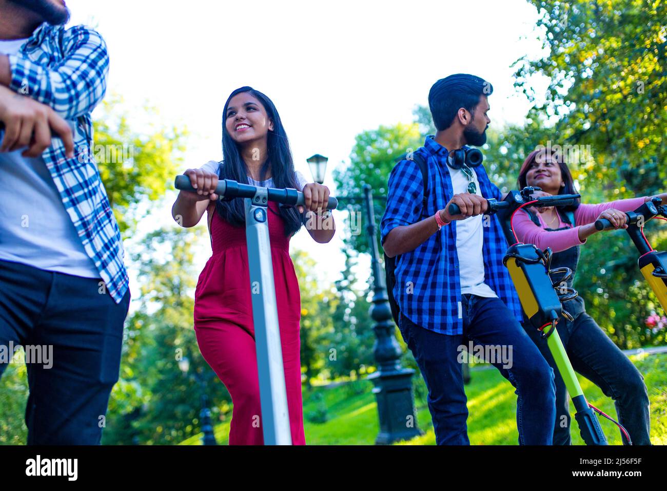 indian ethnicity friendship togetherness in park on sunny day Stock Photo