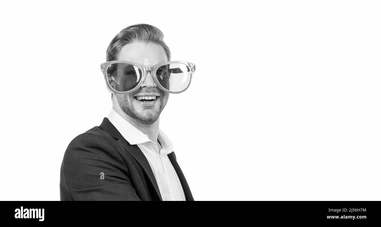 Work all day party all night. Happy man wear funny glasses. Corporate party. Work celebration Stock Photo