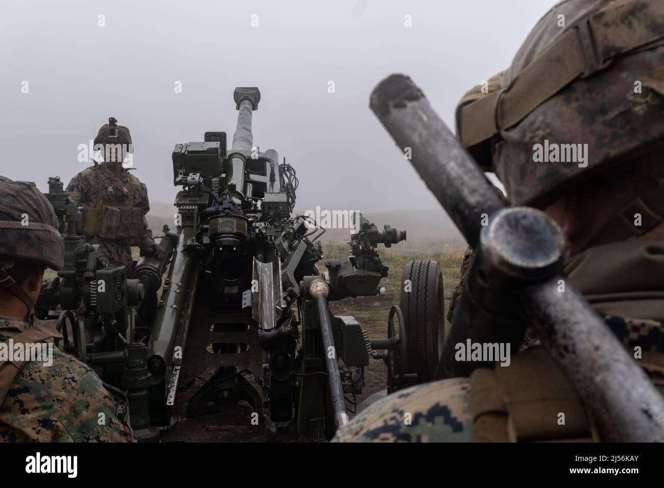 Kusu, Oita, Japan. 15th Apr, 2022. U.S. Marines with 3d Battalion, 12th Marines, 3d Marine Division, conduct dry fire drills with an M777 towed 155 mm howitzer during Artillery Relocation Training Program 22.1 at the Japan Ground Self-Defense Force Hijudai Training Area, Japan, April 15, 2022. ARTP is an exercise which contributes to the defense of Japan and the U.S.-Japan Alliance as the cornerstone of peace and security in the Indo-Pacific region. The skills developed at ARTP increase the lethality and proficiency of the only permanently forward-deployed artillery unit in the Marine Corps, Stock Photo