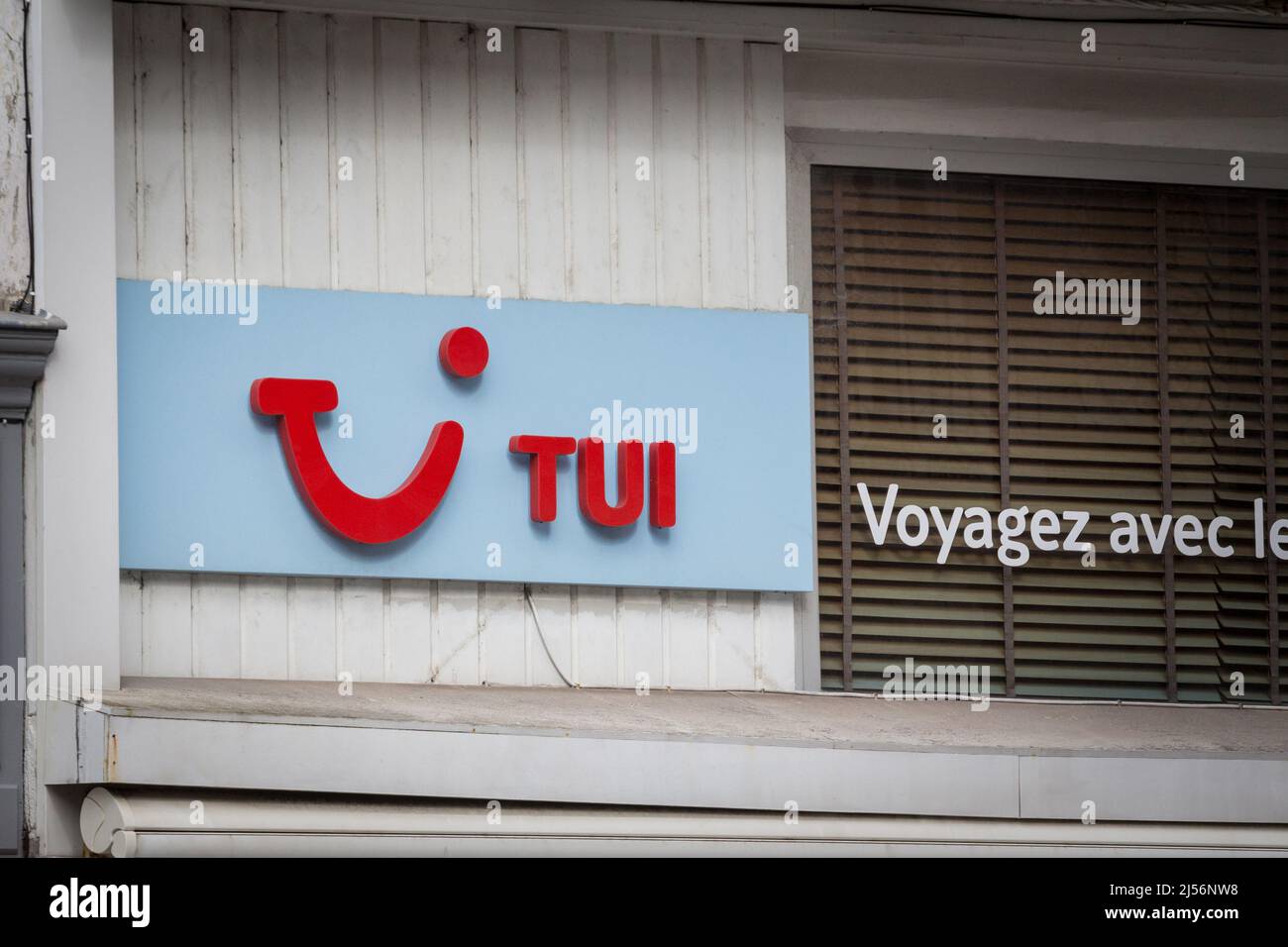 Picture of a TUI sign on their local retail shop, also known as ReiseCenter, or Travel Center, in Bordeaux, France. TUI Group, or Touristik Union Inte Stock Photo