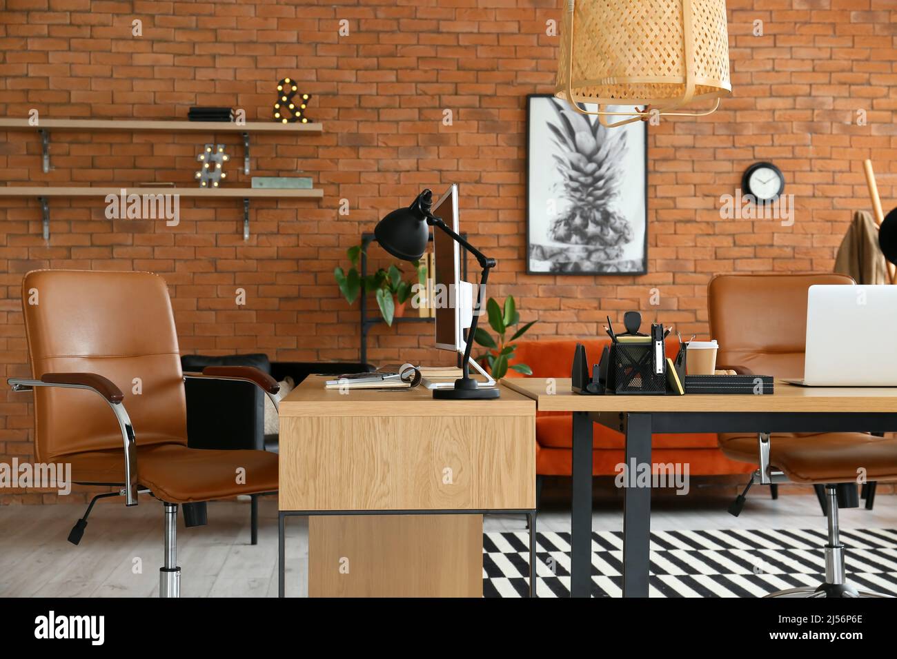 Workplaces with modern computers in stylish office Stock Photo