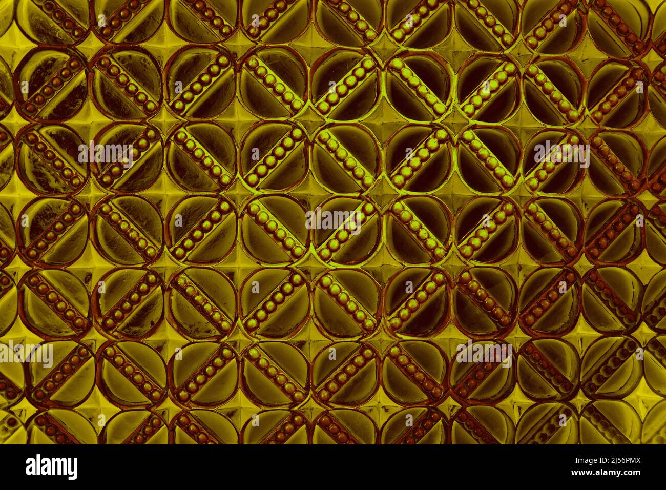 Burgundy net pattern accentuated by a net of gold Stock Photo - Alamy