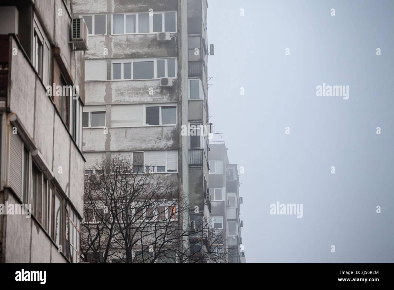 Picture of Eastern European towers in Belgrade, Serbia, in poor condition with concrete falling down. These buildings are a symbol of the brutalist ar Stock Photo