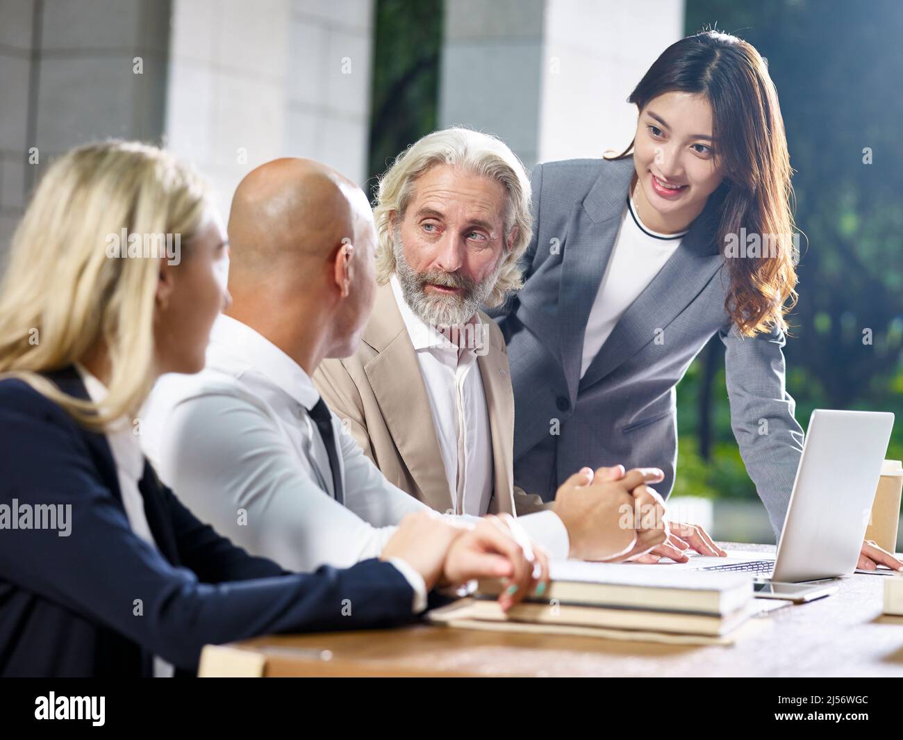 multiethnic group of corporate business people meeting in office Stock Photo