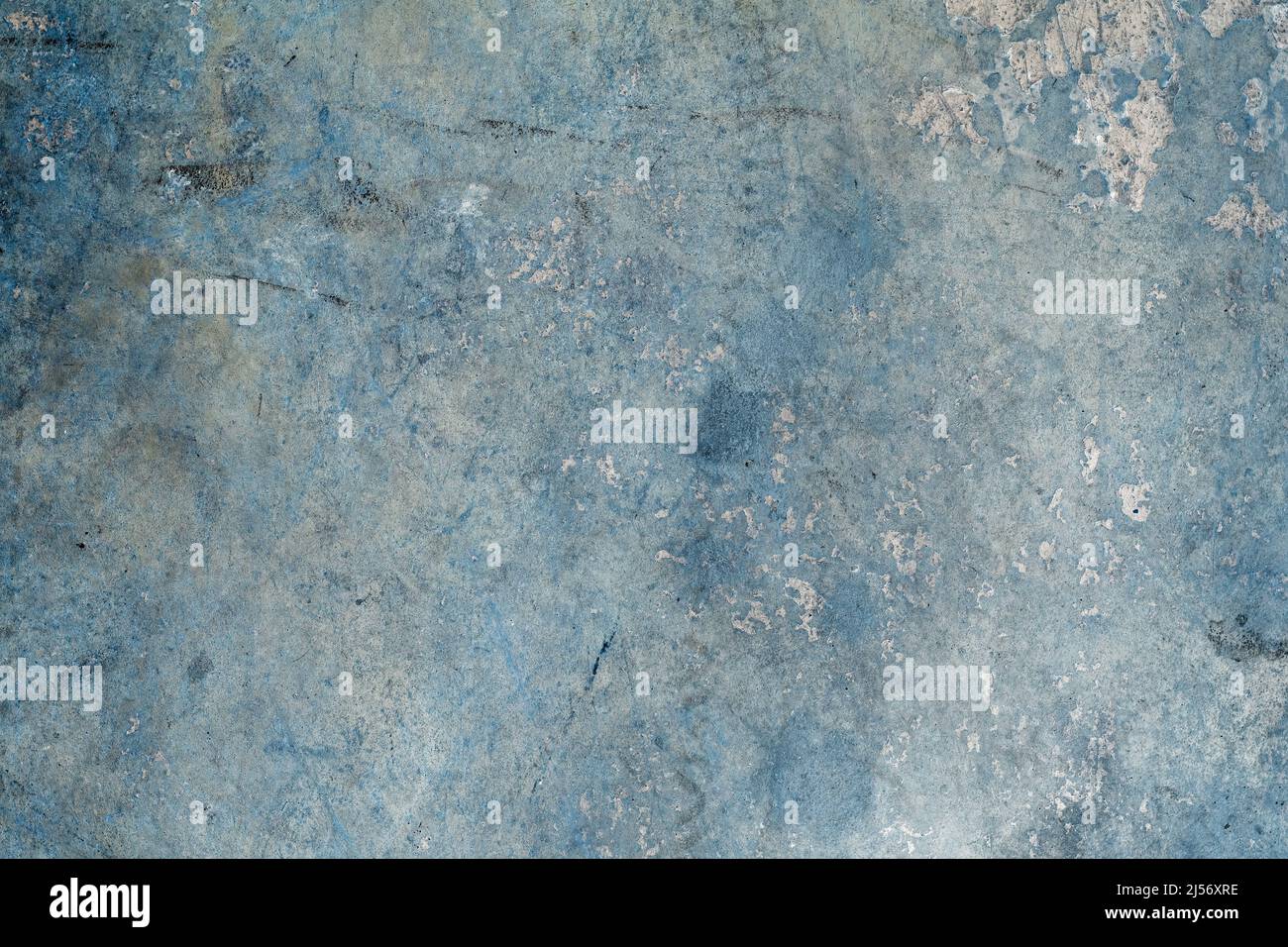 Rustic old metal sheet with scratches and spots for texture background
