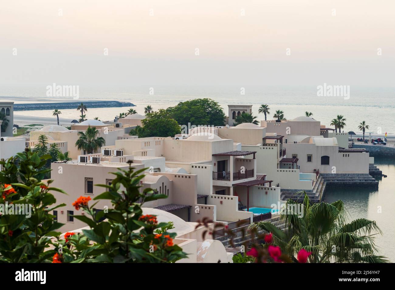 Ras Al Khaimah, UAE - 04.04.2022 - View of the beach and private villas at The Cove Rotana Resort Stock Photo