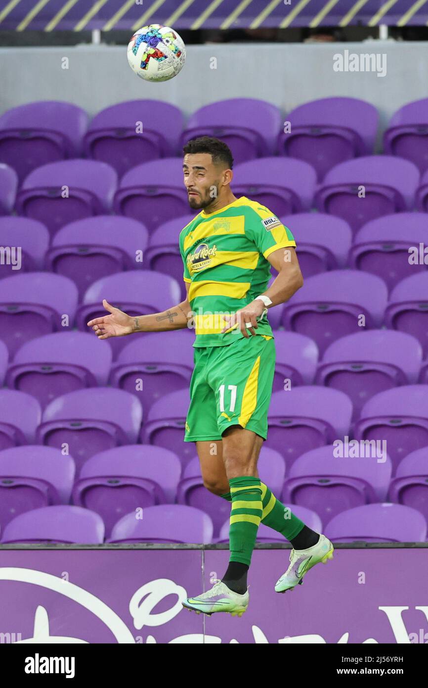 April 20, 2022: Tampa Bay Rowdies midfielder LEO FERNANDES (11) gets a  header during the Orlando City vs Tampa Bay Rowdies soccer match at  Exploria Stadium in Orlando, FL on April 12