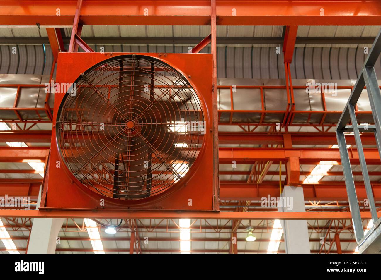 Big industrial cooler red fans in factory for reduced heat in operation  ventilation of plant, industry cooling mechanical fan Stock Photo - Alamy