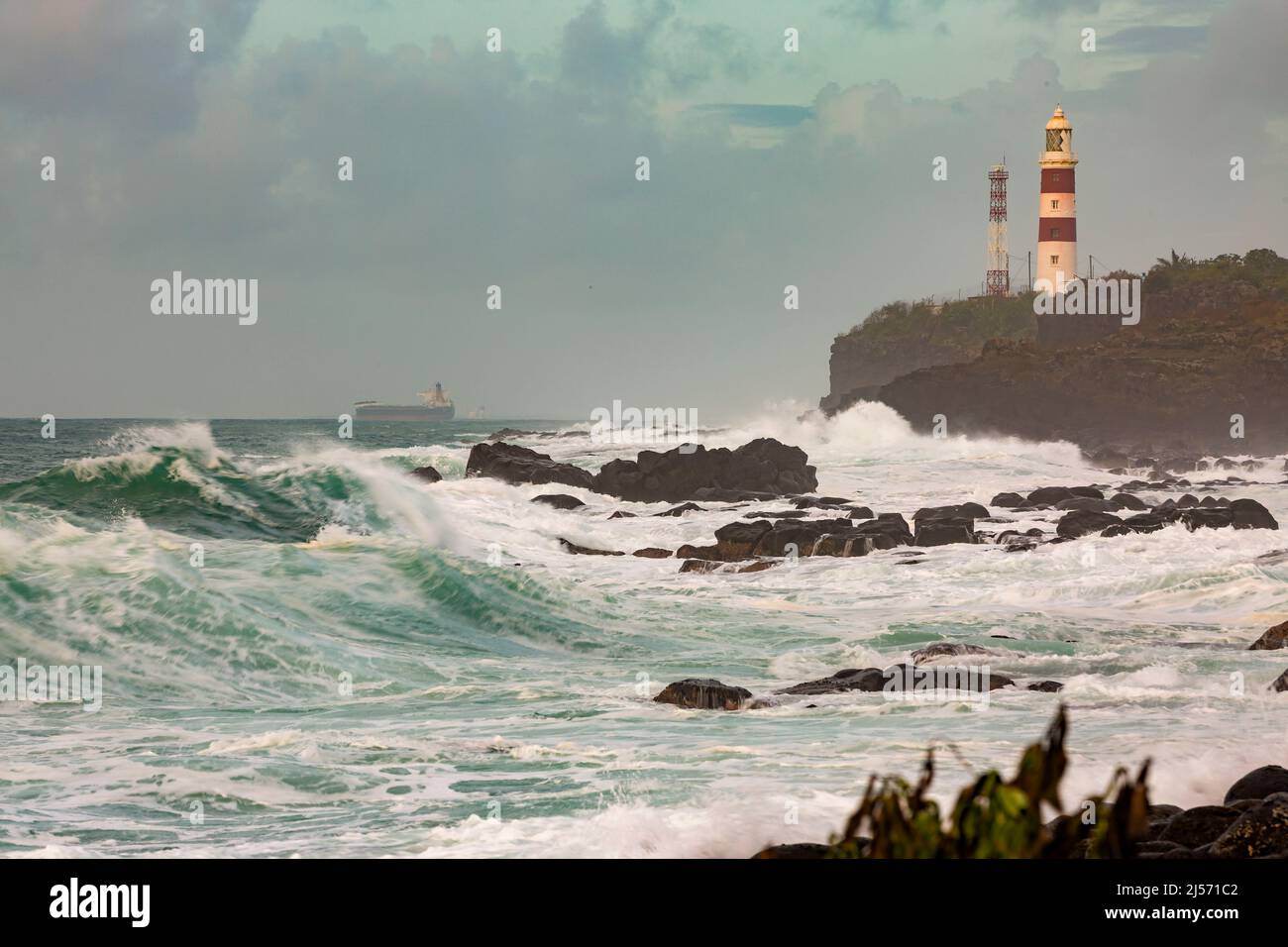 The Albion Lighthouse, otherwise known as the Pointe aux Caves Lighthouse during tropical cyclone, Batsirai in the island of Mauritius. Stock Photo