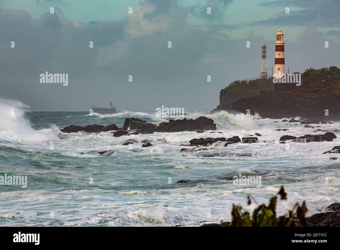 The Albion Lighthouse, otherwise known as the Pointe aux Caves Lighthouse during tropical cyclone, Batsirai in the island of Mauritius. Stock Photo