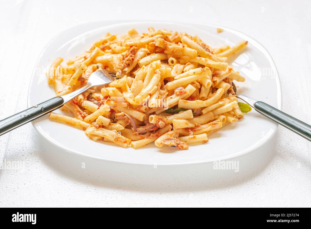 boiled pasta cooked in tuna fish. Stock Photo