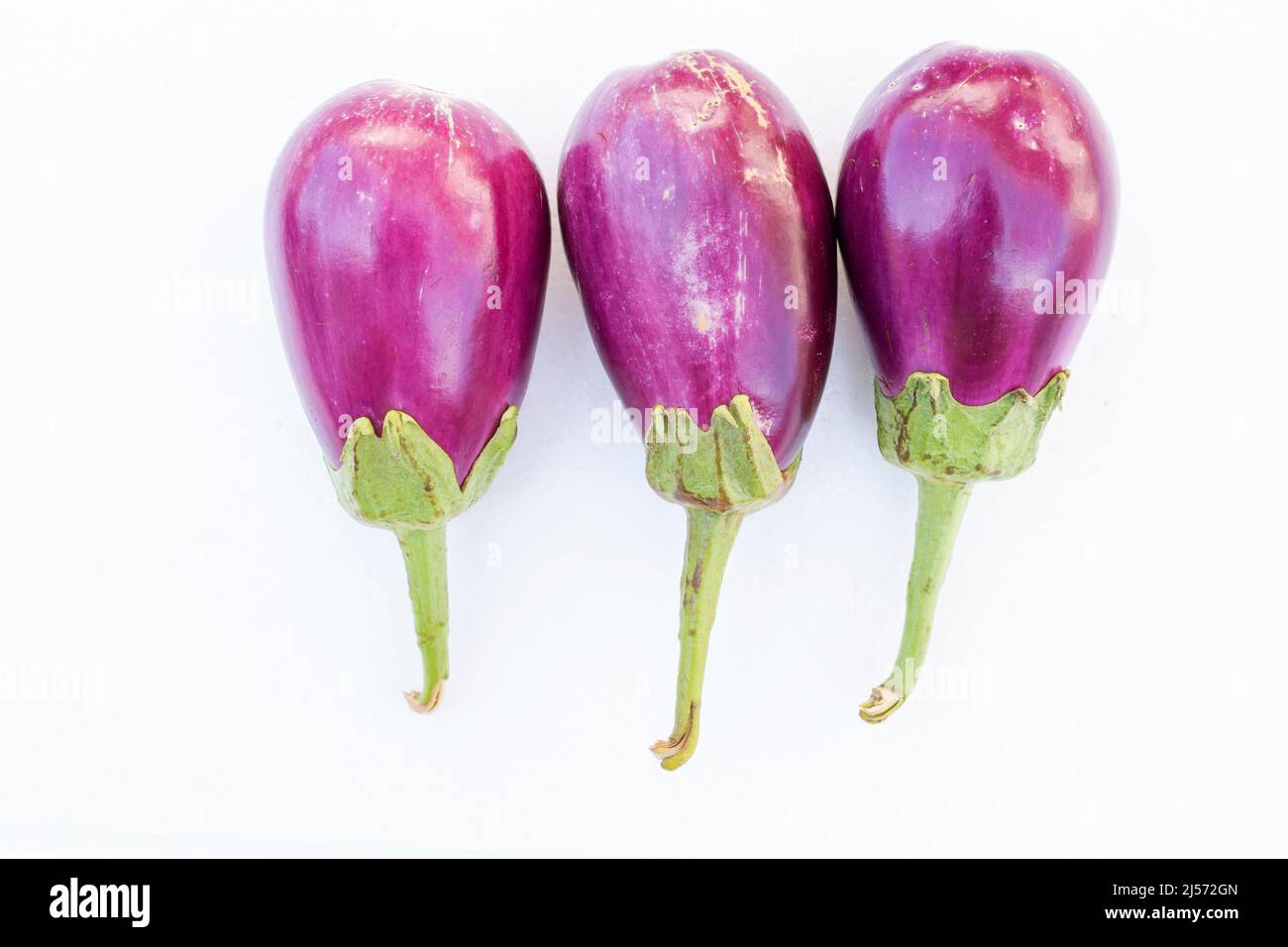 Eggplants On White Background Stock Photo