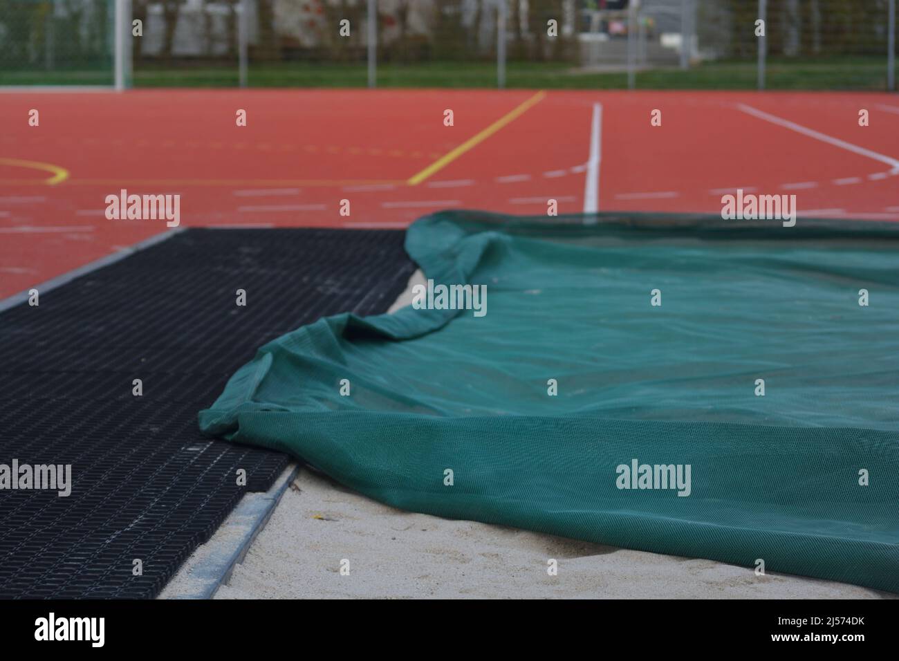 Track and Field Long Jump Sand Pit prepared for being used Stock Photo
