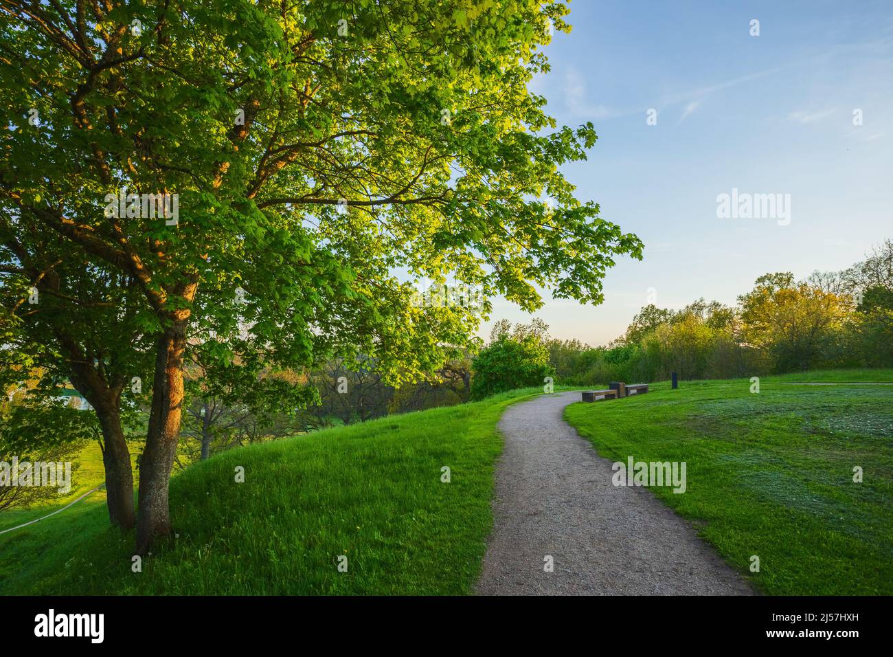 Kernave at spring, green mounds at historic capital in Lithuania Stock Photo