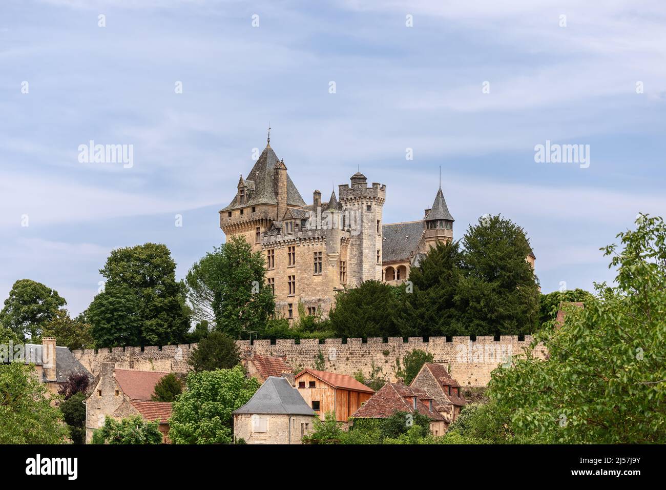 Castle Chateau de Montfort is imposing monument, combines elements of medieval and renaissance style architecture. Vitrac commune,  Dordogne, France Stock Photo