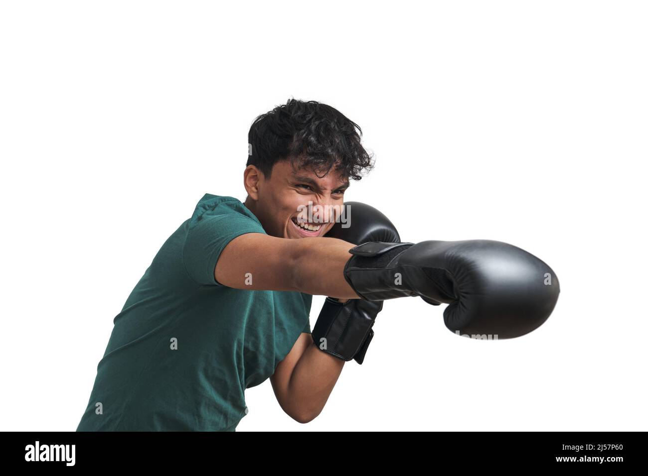Young peruvian boxer throwing a right straight isolated. Stock Photo
