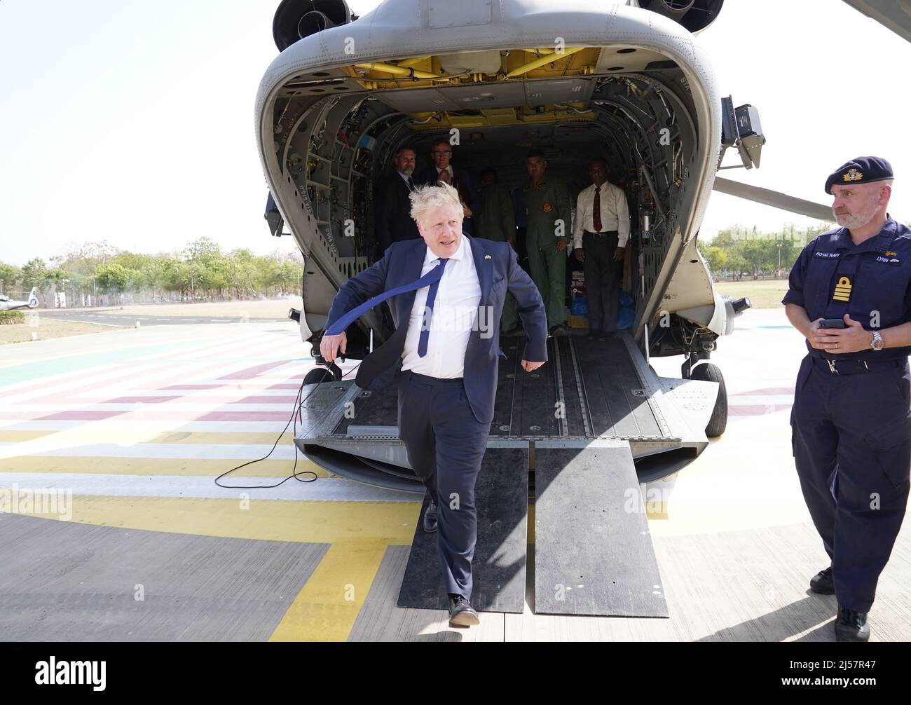 Prime Minister Boris Johnson leaving an Indian military Chinook helicopter in Ahmedabad after a flight from the JCB factory at Vadodara in India's Gujarat state. See PA story POLITICS India. Photo credit should read: Stefan Rousseau/PA Wire Stock Photo