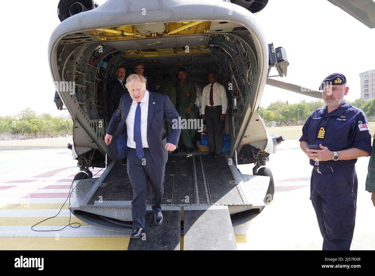 Prime Minister Boris Johnson leaving an Indian military Chinook helicopter in Ahmedabad after a flight from the JCB factory at Vadodara in India's Gujarat state. See PA story POLITICS India. Photo credit should read: Stefan Rousseau/PA Wire Stock Photo