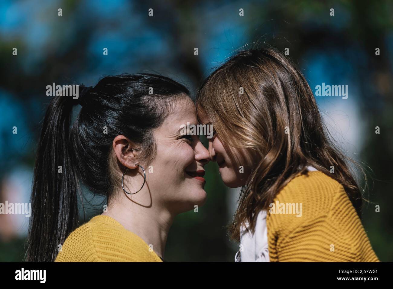 Little cute child baby girl kiss on cheek and hug, embrace with happy ...