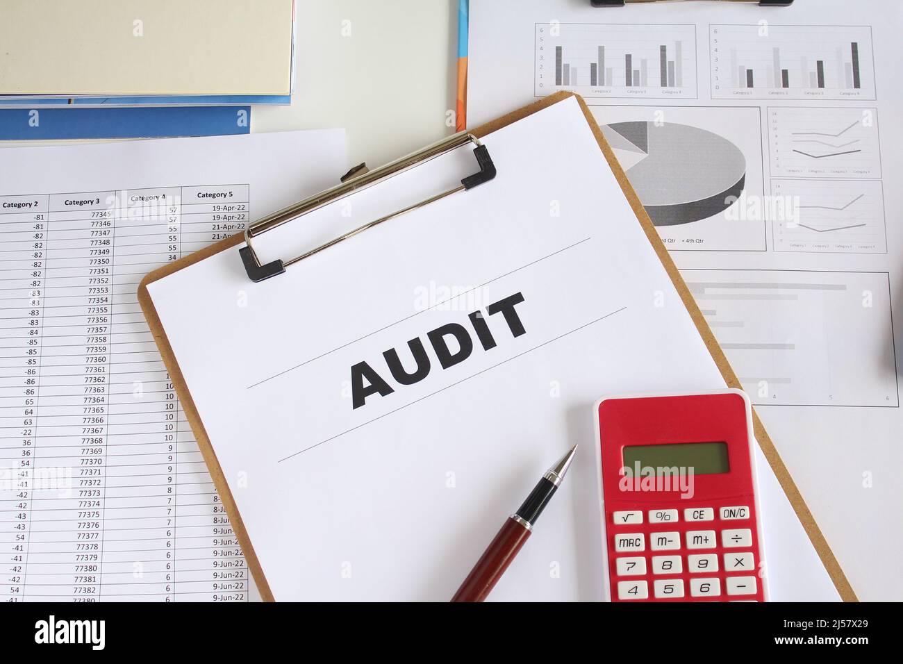 dark wing Thorns Audit words on working paper for auditors. Auditor tools like pen, memory  stick, calculator and measuring tape, with data and charts Stock Photo -  Alamy