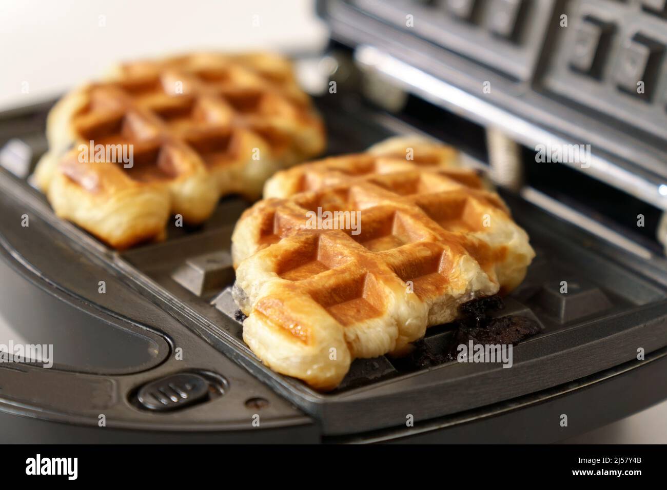 Croffle croissant and waffle. Soft and layered croissant dough is