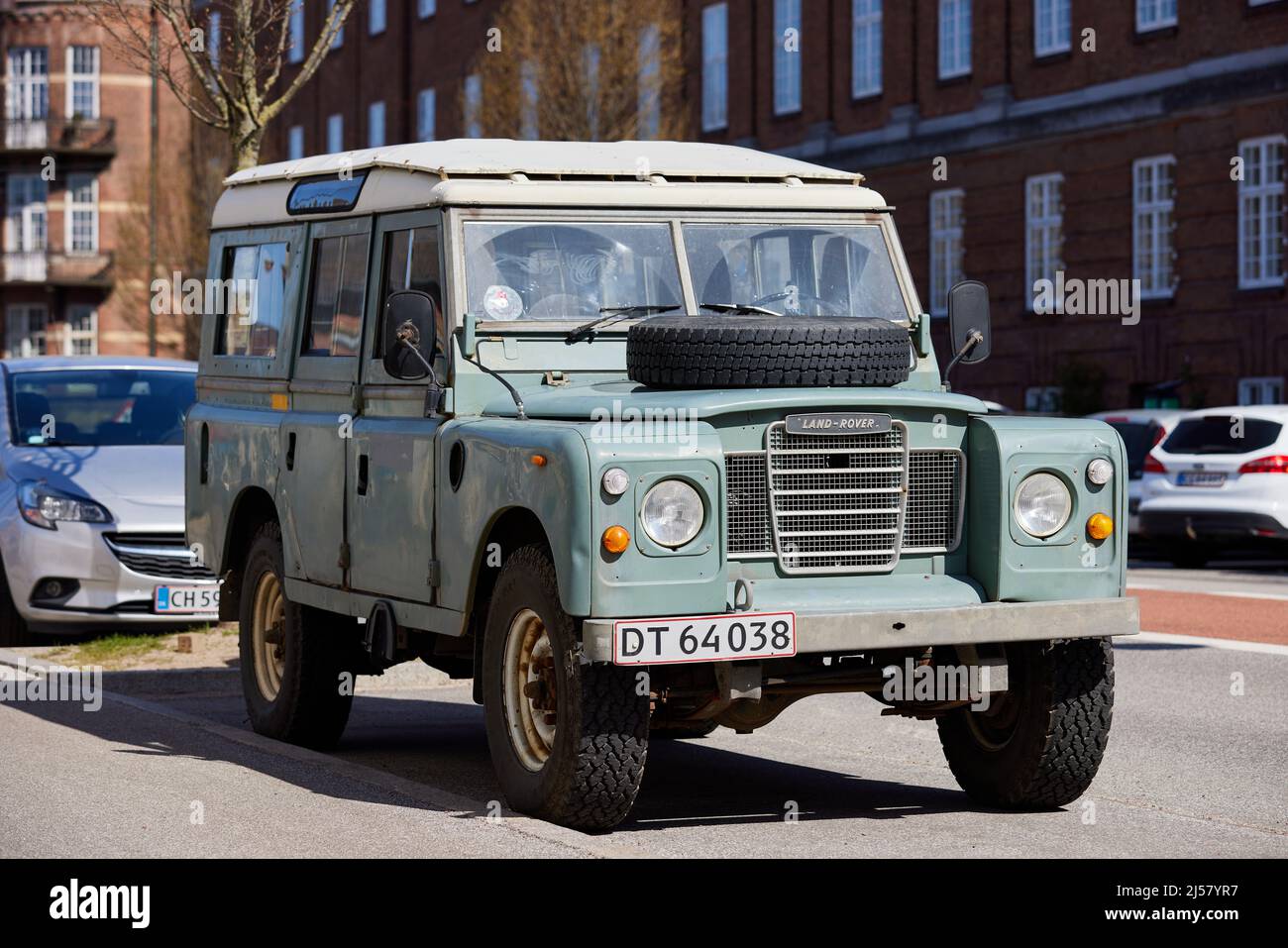 Land Rover, light green / pastel green (LRC005), parked on street Stock Photo