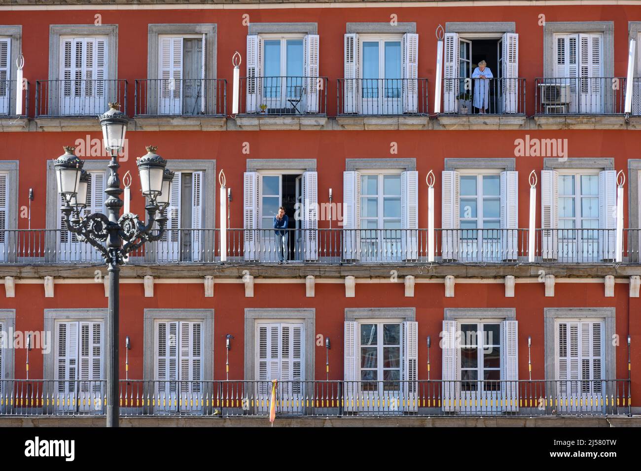 Windows and balconies on the facade of the buildings enclosing the Plaza Mayor, central Madrid, Spain. Stock Photo