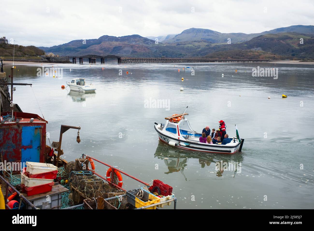 Ferry boat from Fairbourne arrived at Barmouth harbour Stock Photo
