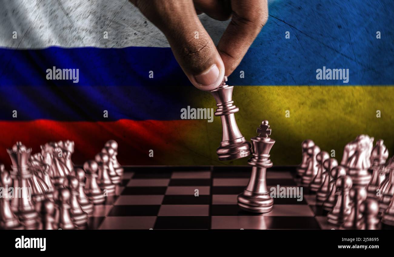 Russia vs Ukraine concept, Russia vs Ukraine chess pieces, Russia vs Ukraine political conflict, Russia vs Ukraine chess piece Stock Photo