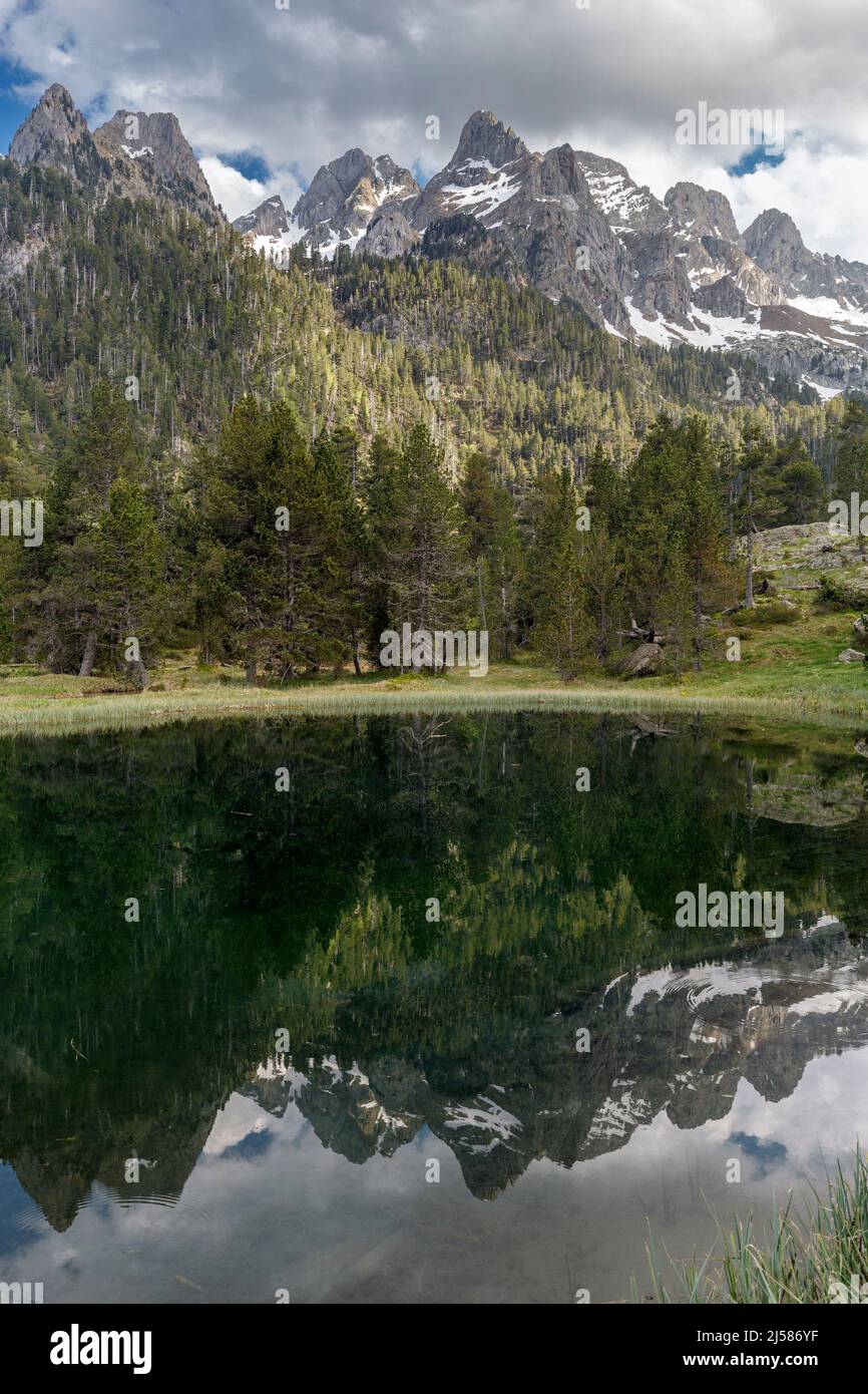 Chuise peak reflected on Batisielles lake, Posets Maladeta natural park, spanish pyrenees Stock Photo