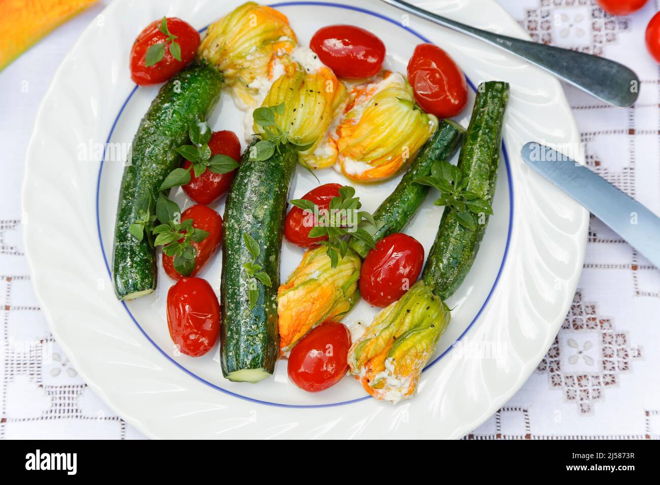 Southern German cuisine, stuffed courgette flowers sauteed on plate