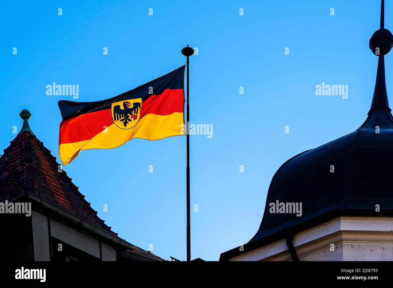 Germany flag on flagpole, Lindau, Swabia, Bavaria, Germany Stock Photo