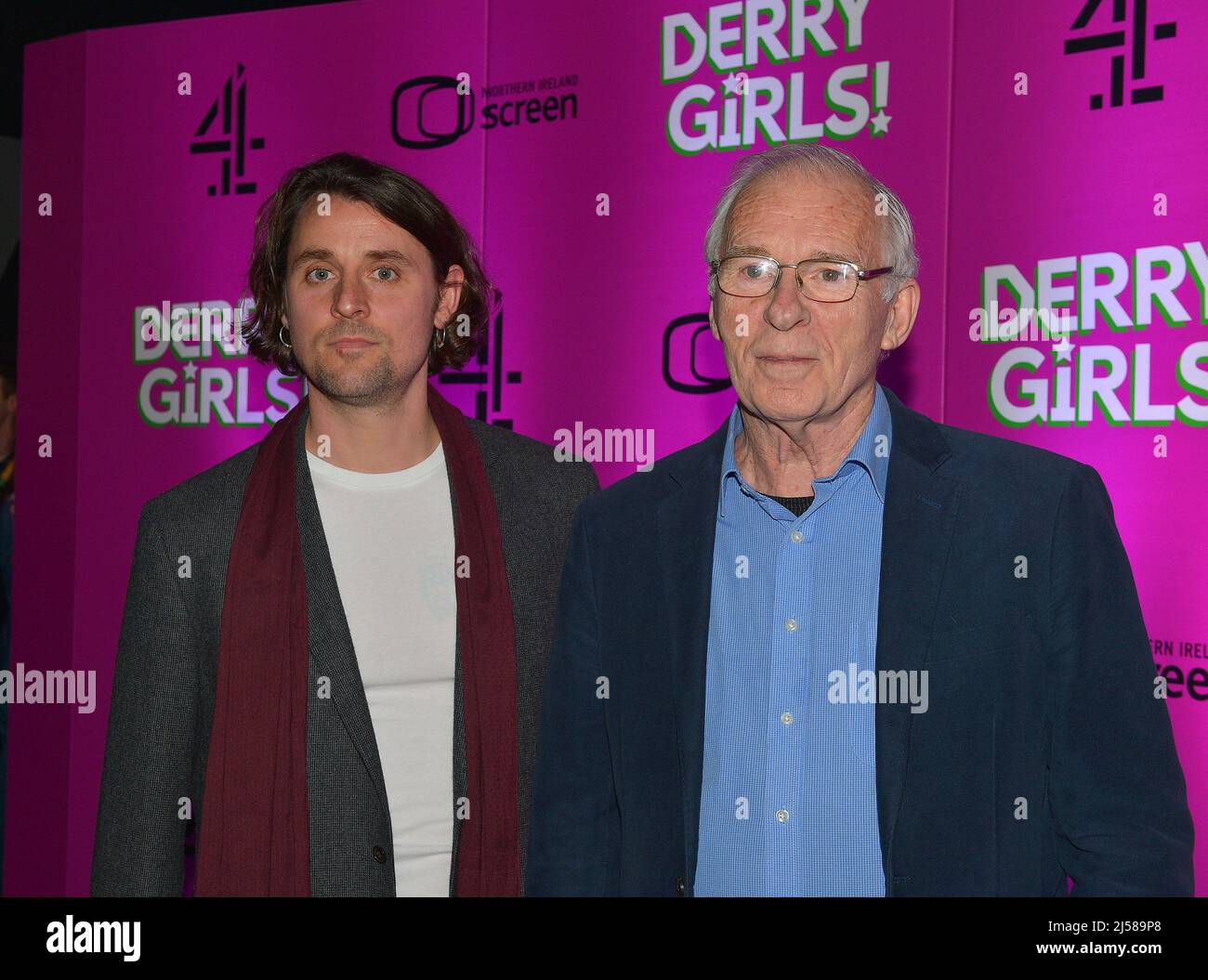 Art Campion (Father Peter) and Ian McElhinney (Granda Joe) at the premiere of Derry Girls Season 3 in Derry, Londonderry, Northern Ireland, 7 April 2022. ©George Sweeney / Alamy Stock Photo Stock Photo