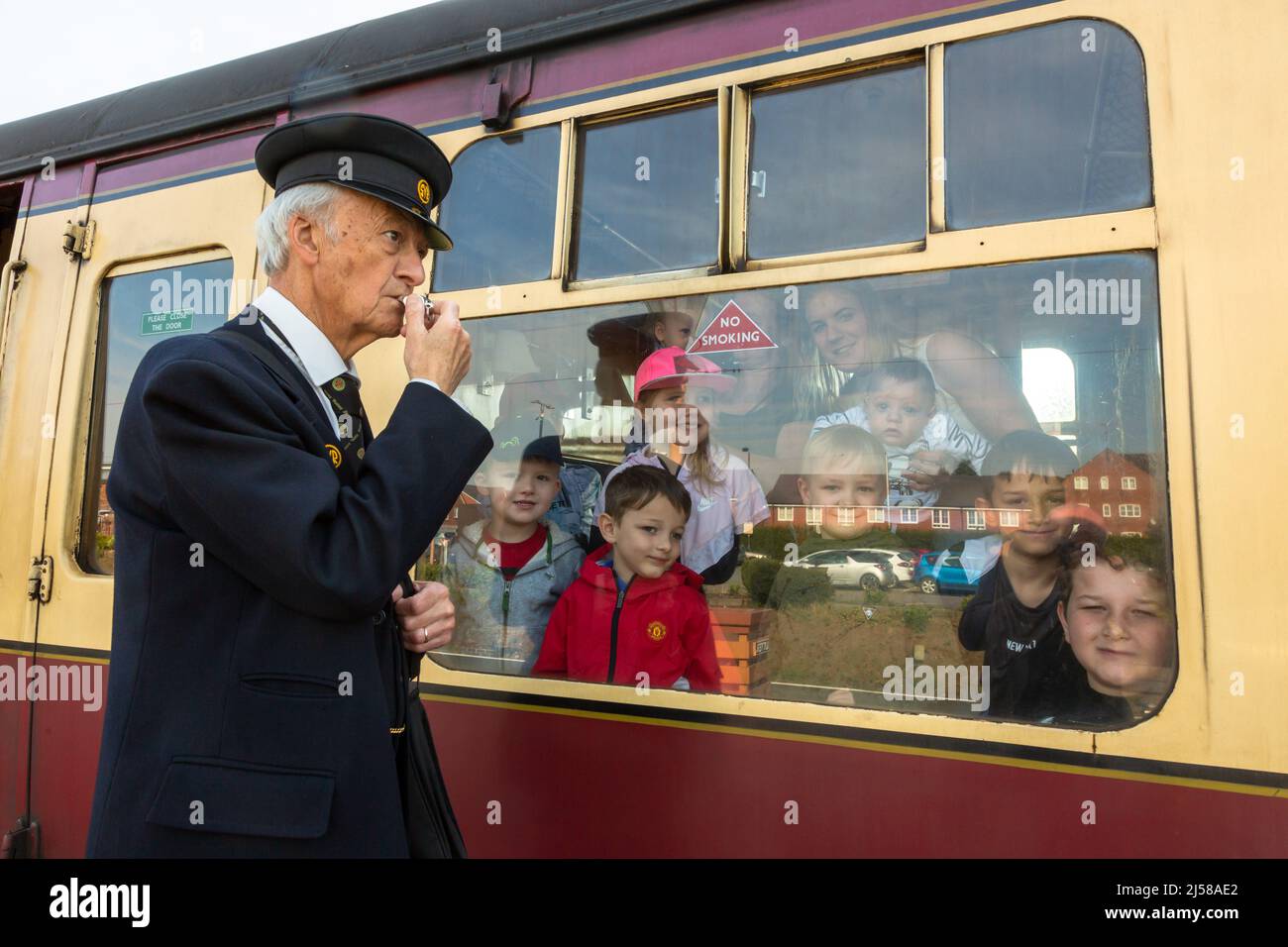 Kidderminster, Worcs, UK. 21st Apr, 2022. Excited children watch as a guard sends a steam train off to Bridgnorth from Kidderminster on the first day of the Severn Valley Railway's Spring Steam Gala. The SVR is one of many heritage railways in Britain which faces potential critical coal shortages. UK heritage railways currently uses about 26,000 tonnes of coal each year. Credit: Peter Lopeman/Alamy Live News Stock Photo