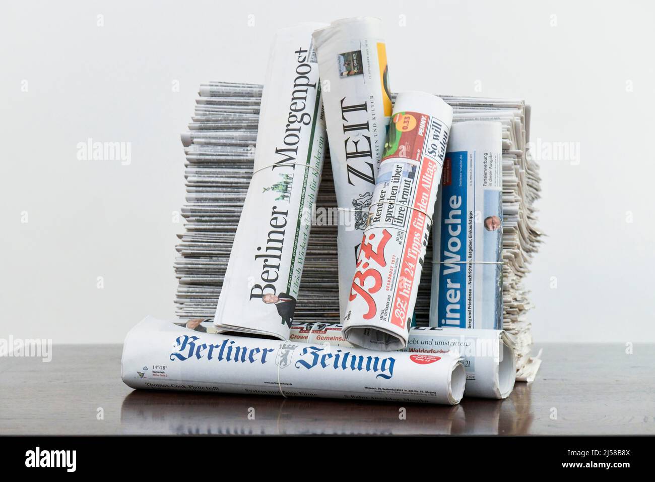 Stack of various daily newspapers Stock Photo