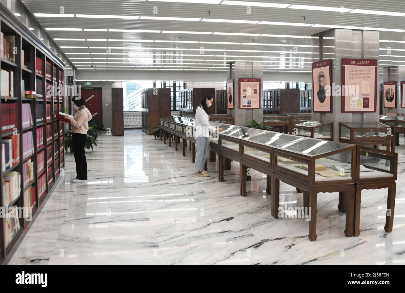 Beijing, China. 19th Apr, 2022. People read at Peking University ...