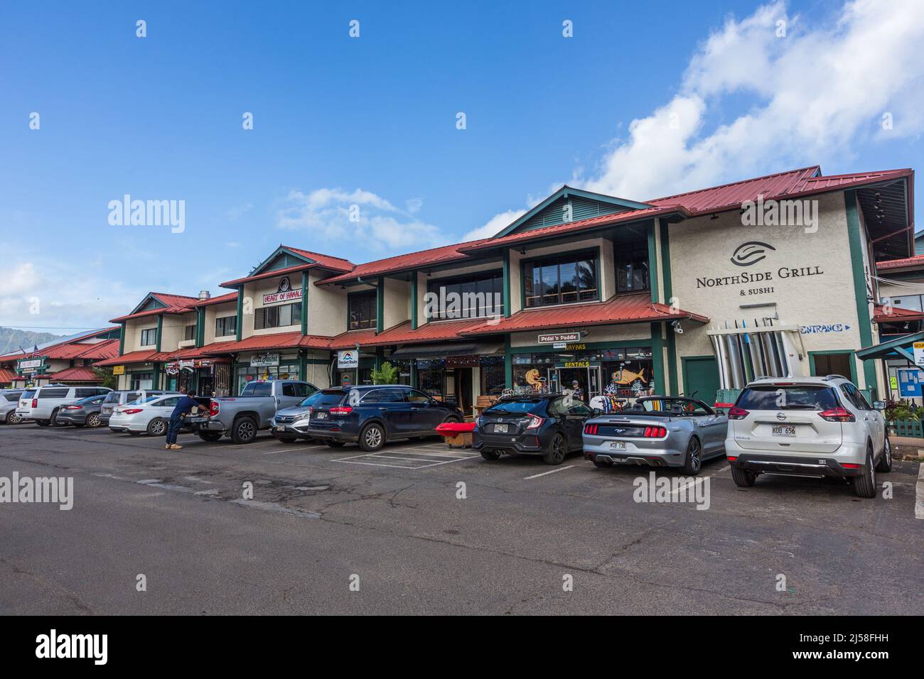 Restaurants and tourist shops in a shopping center in Hanalei, Kauai, Hawaii. Stock Photo