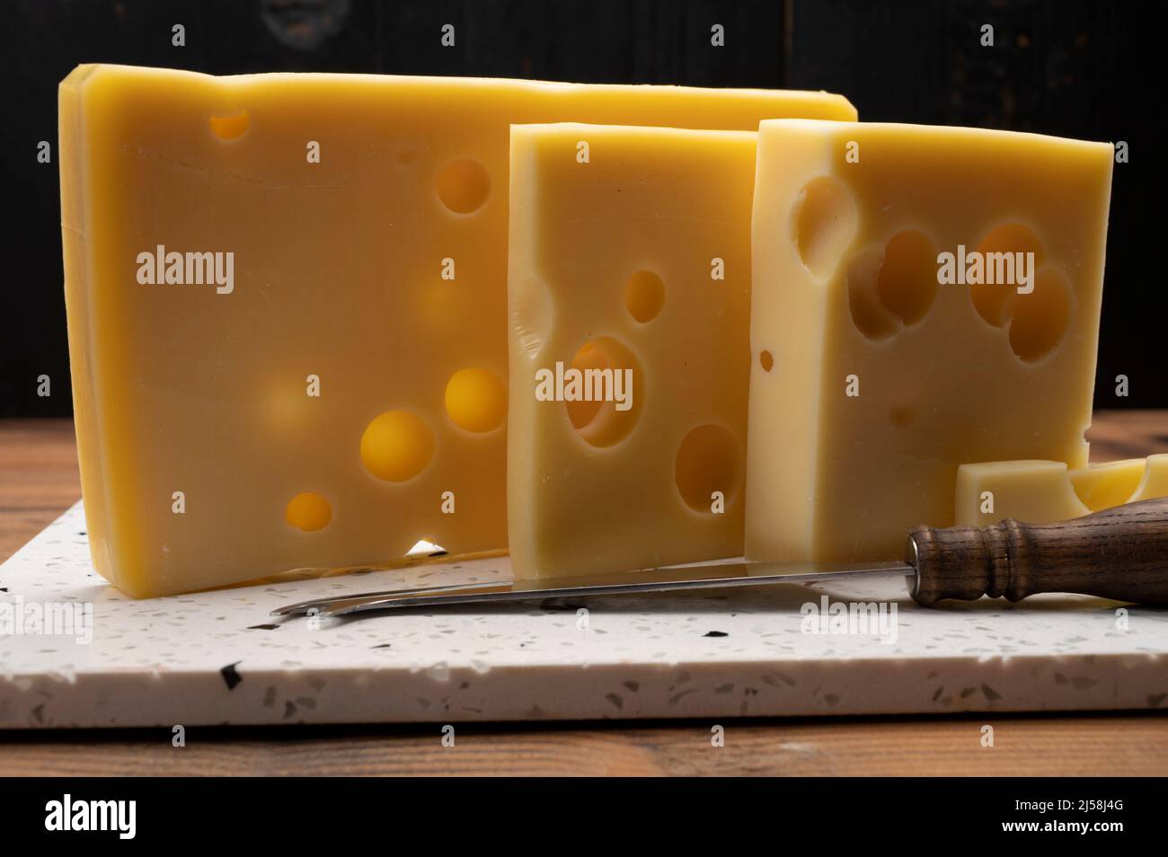 Swiss cheese collection, yellow emmentaler or emmental cheese with
