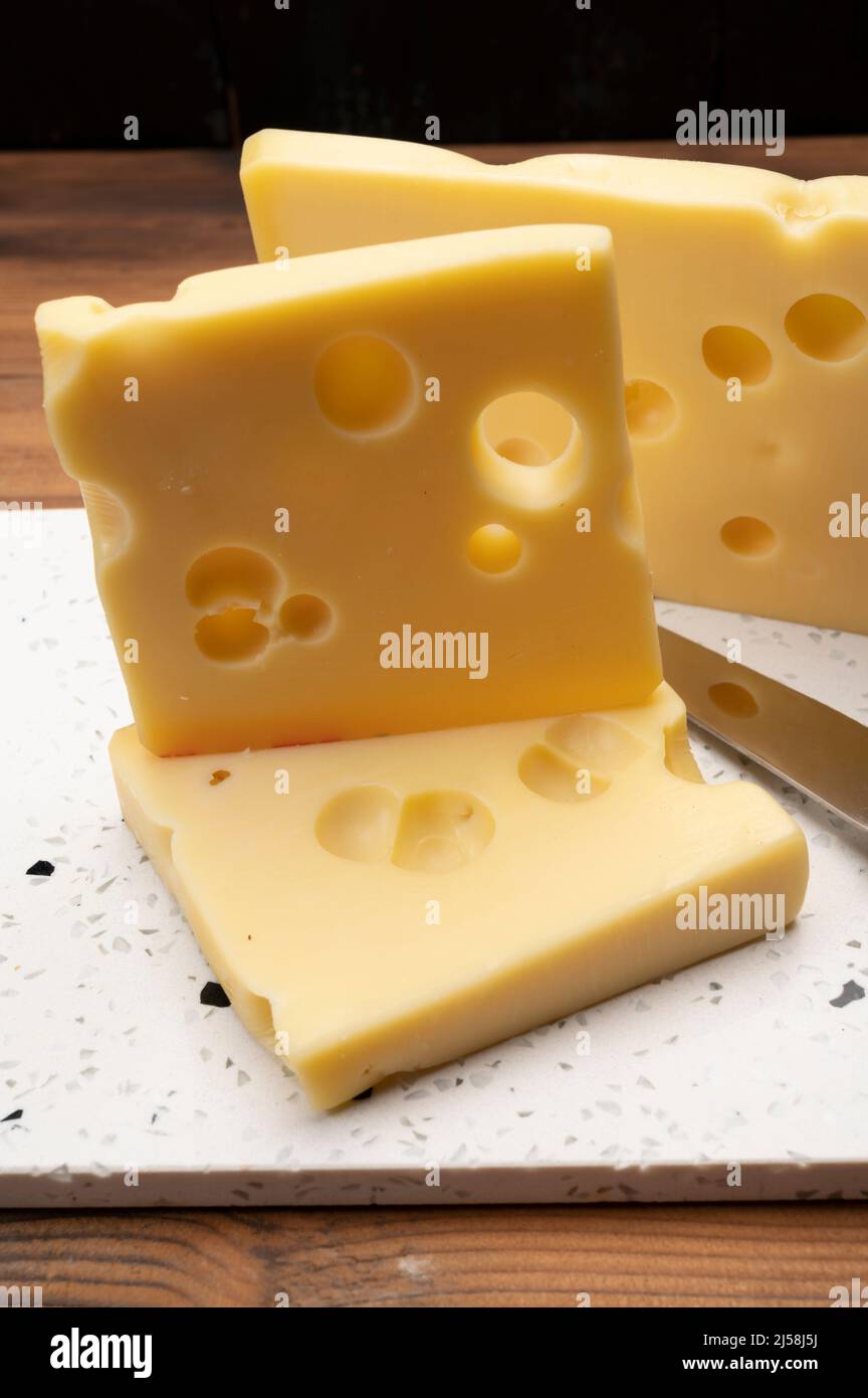 Swiss cheese collection, yellow emmentaler or emmental cheese with