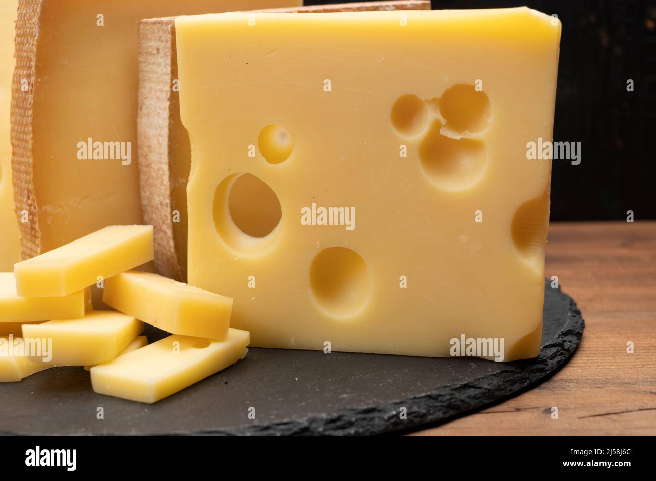 Swiss cheese collection, emmentaler with holes, gruyere, appenzeller ...