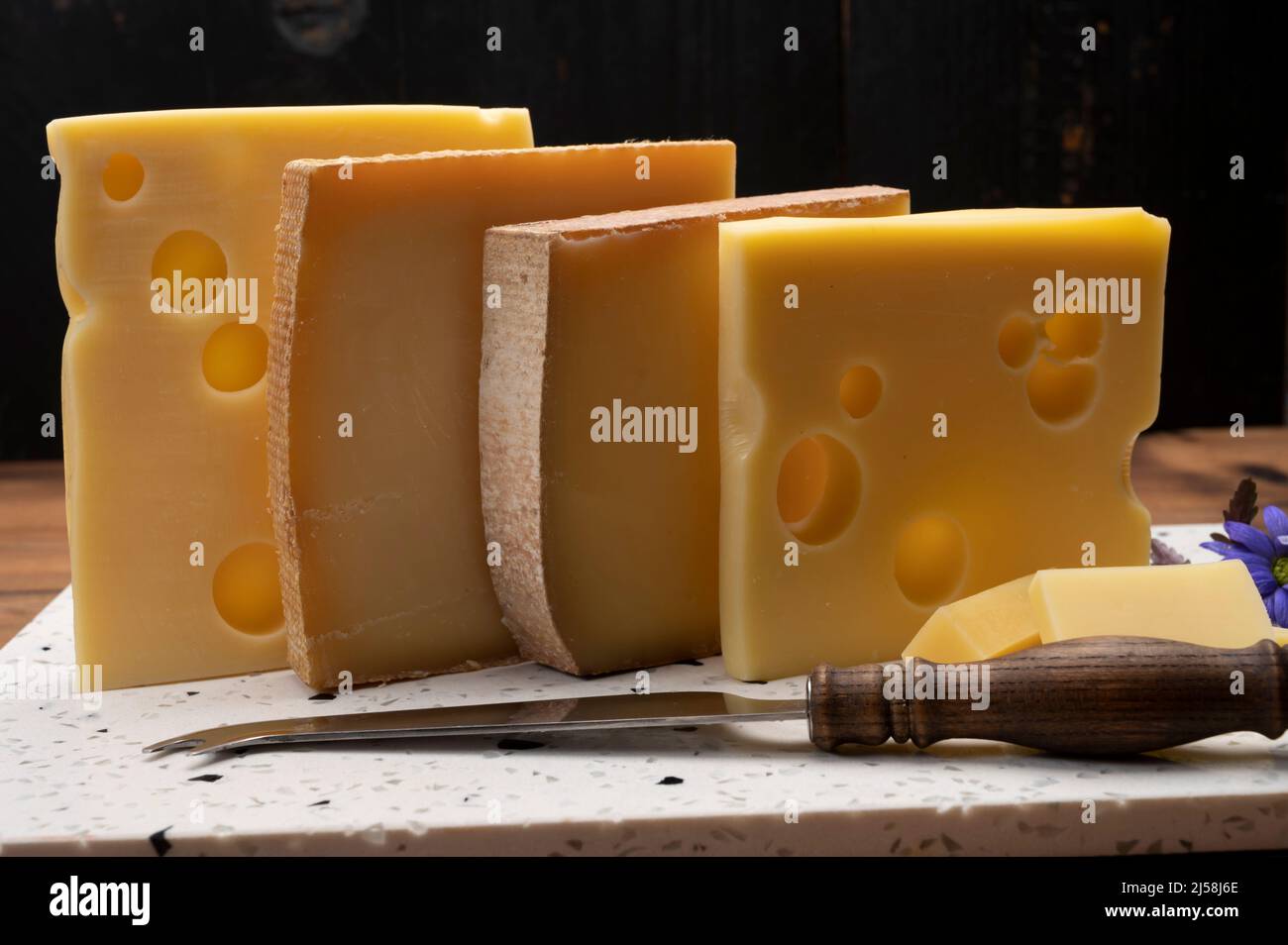 Swiss cheese collection, emmentaler with holes, gruyere, appenzeller ...