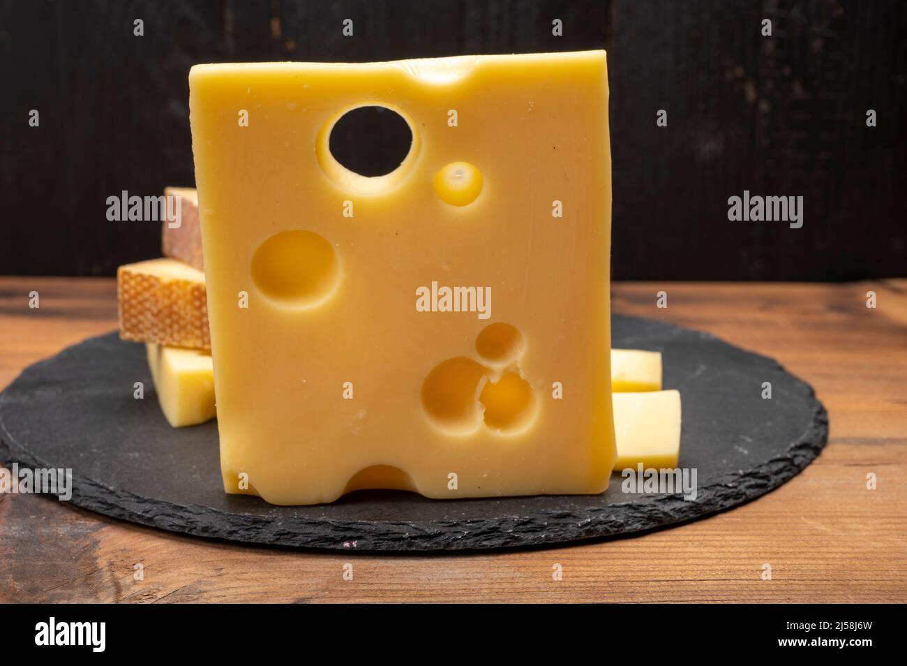 Swiss cheese collection, emmentaler with holes, gruyere, appenzeller ... Swiss cheese collection, emmentaler with holes, gruyere, appenzeller ...
