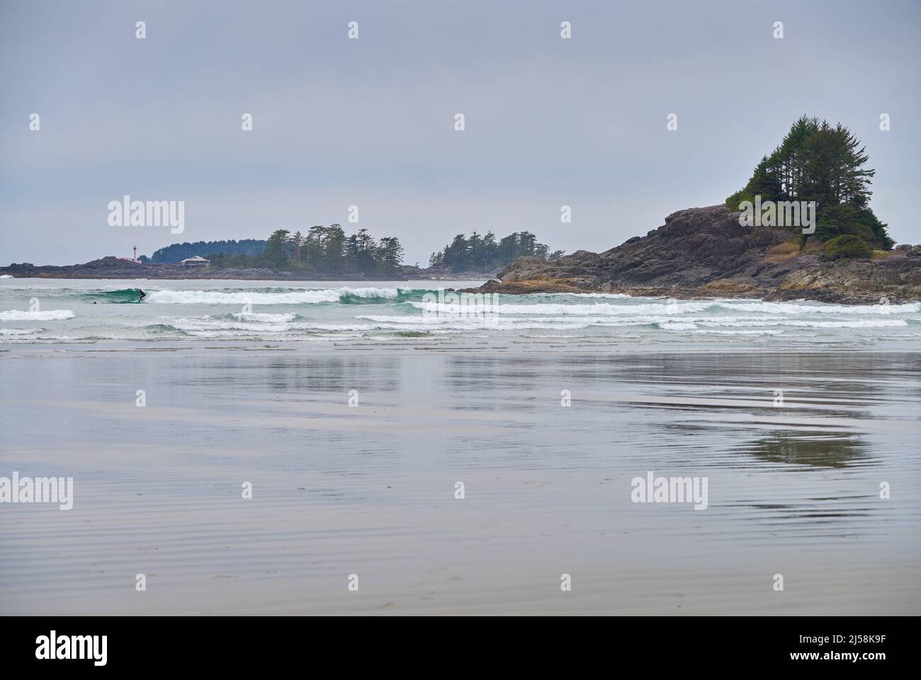 Cox Bay Vancouver Island Surf. Surf rolling in at Cox Beach, Vancouver Island near Tofino. Stock Photo